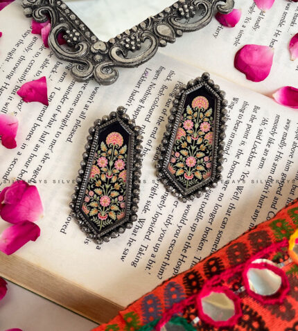 Black floral studs